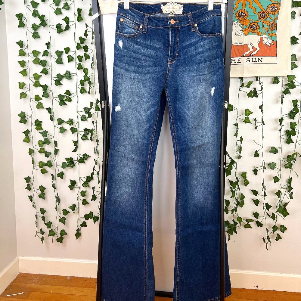 Distressed flare jean.